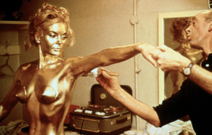 Naked bond girl in gold body paint 
