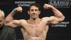 Middleweight Tim Kennedy, of the United States, poses during the weigh-in Tuesday, April 15, 2014, in Quebec City for the UFC's "The Ultimate Fighter Nations" event Wednesday. Kennedy faces Michael Bisping, of England. (AP Photo/The Canadian Press, Jacques Boissinot)