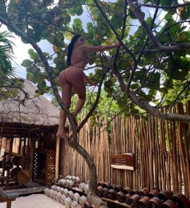 Valentina Vandals hot girl climbs a tree in thong bikini