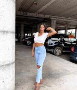 Shani Shetach poses in a parking garage